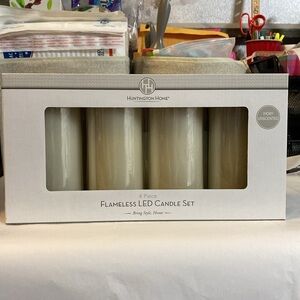 New in box Huntington Home 4 piece wax‎ flameless LED unscented ivory candle set